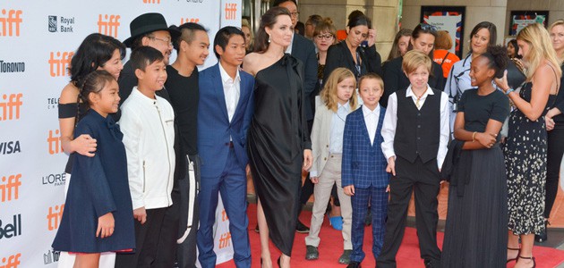 Angelina and her kids and some cast members at the film premiere of First They Killed My Father