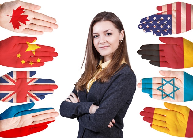 Business-woman-with-flags-from-several-countries