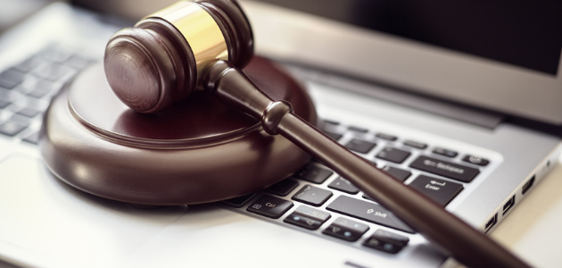Gavel on top of a laptop