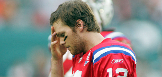 Tom Brady in a football game against Dolphins in 2009