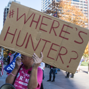 Trump Supporters hold signs that say "Where's Hunter" at a Stop the Steal rally