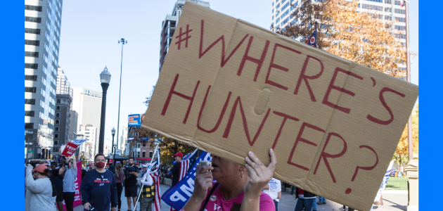 Trump Supporters hold signs that say "Where's Hunter" at a Stop the Steal rally