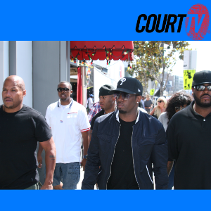 P. Diddy walking with members of his entourage at the Sean Jean pop-up store in Los Angeles, CA