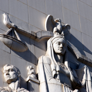 Scales of justice craving. Stone carving of the scales of justice on an exterior wall of the Los Angeles Courthouse.
