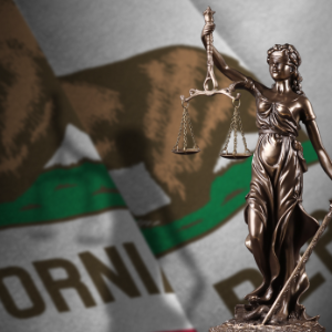California flag and lady justice statue indicating CA divorce